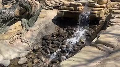 自然景观石头河流瀑布实拍视频素材视频的预览图